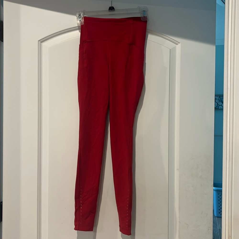 Lululemon Leggings. Size 0, reflective ankle. Red, look like new